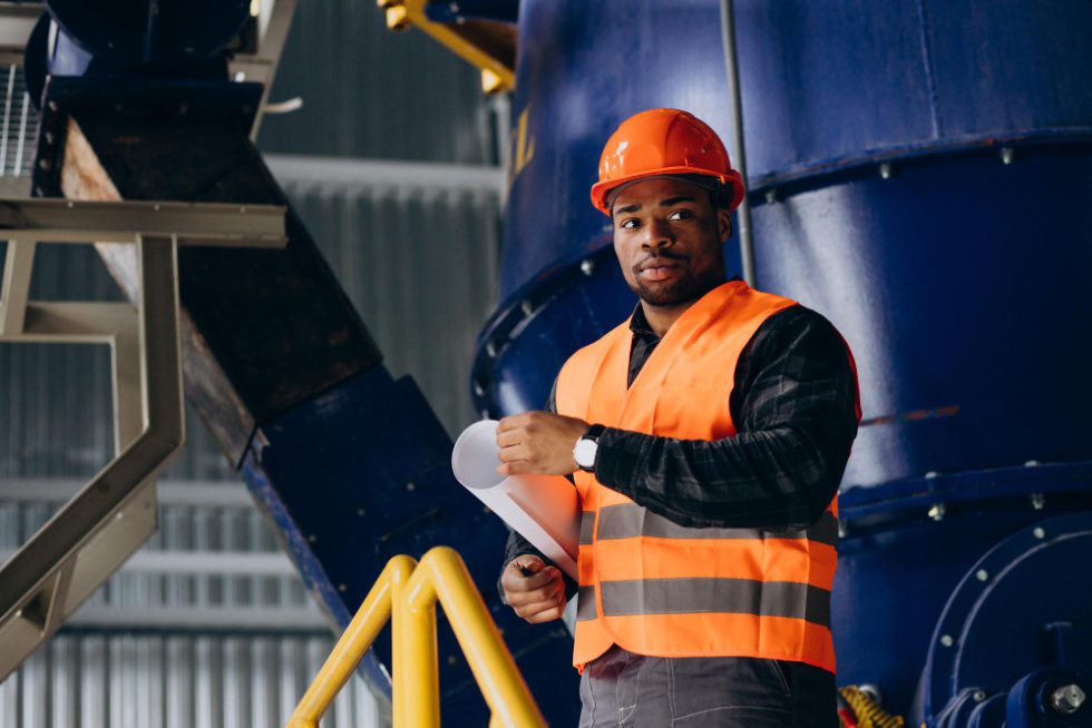 african american worker standing uniform wearing safety hat factory